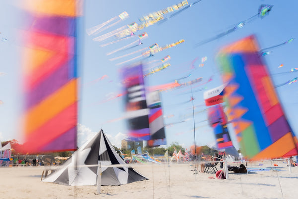 Wind Art in Motion – Colorful Banners by the Beach