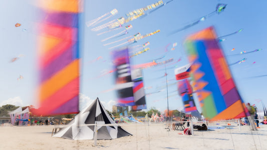 Wind Art in Motion – Colorful Banners by the Beach